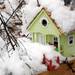 A bird house is covered in snow on Wednesday, Feb. 27, 2013 on Glen Leven Rd. Melanie Maxwell I AnnArbor.com